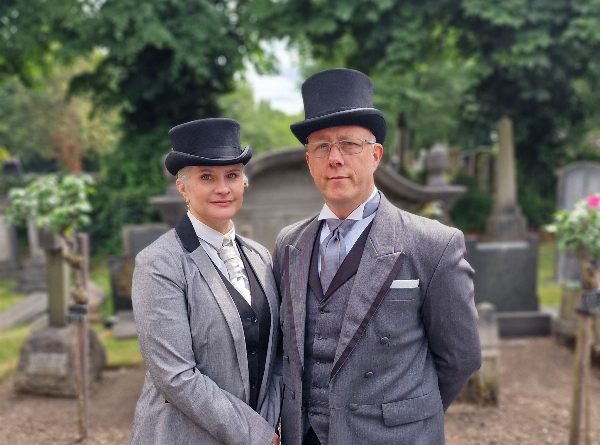 Jason and Sarah O'Brien dressed for leading a funeral at Jason O'Brien & Family Funeral Services Limited in Ashton-Under-Lyne, Greater Manchester