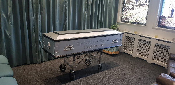 Personalised coffin. Wording, symbol, and colouring chosen by you for your loved one at Jason O'Brien & Family Funeral Services Limited in Ashton-Under-Lyne, Greater Manchester